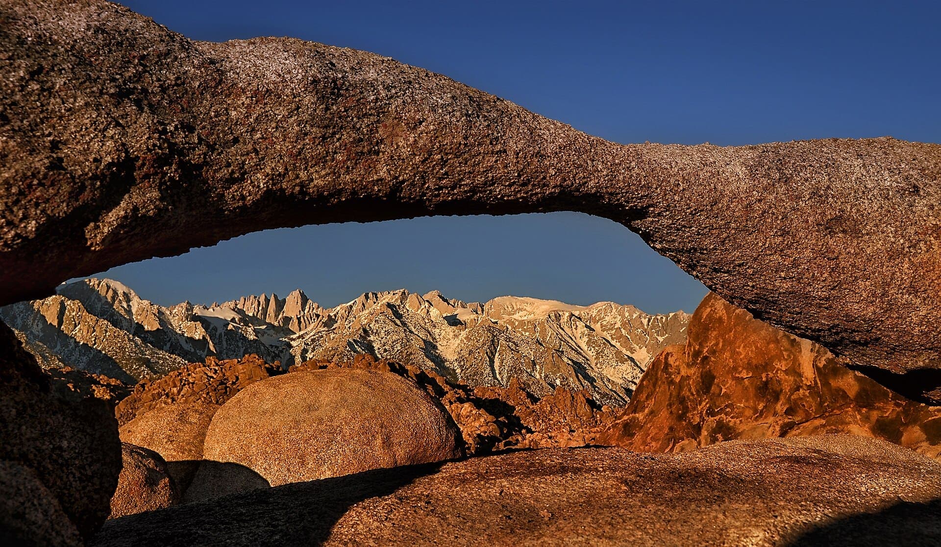 Granite boulders of the Alabama Hills with the Sierra crest behind