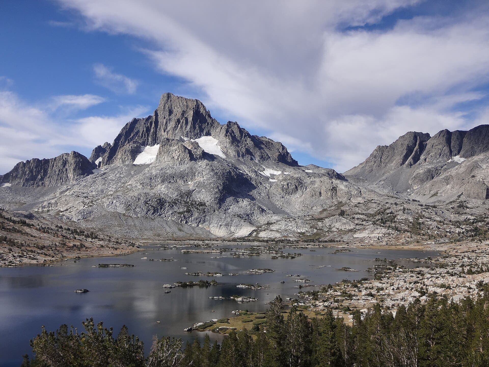Granite islets scattered across Thousand Island Lake at evening